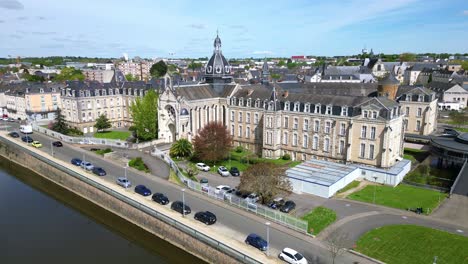 Hospital-building-and-riverside,-Chateau-Gontier-in-France