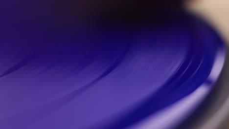 Macro-Close-Up,-Blue-Vinyl-Record-Spinning-on-Vintage-Gramophone-Turntable