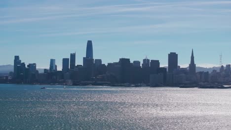 Telephoto-drone-shot-flying-in-towards-downtown-San-Francisco-on-a-sunny-day
