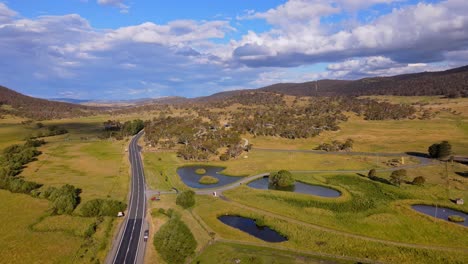 Wide-angle-view-of-Crackenback-with-Alpine-road-during-afternoon-in-New-South-Wales,-Australia