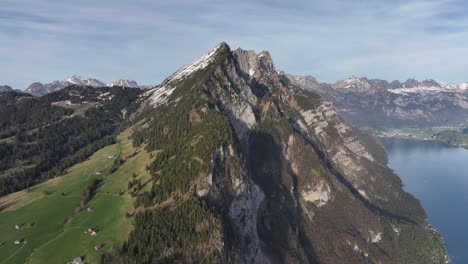 Säntis-Peak-Shadow-over-Lake-Walensee,-Switzerland---aerial