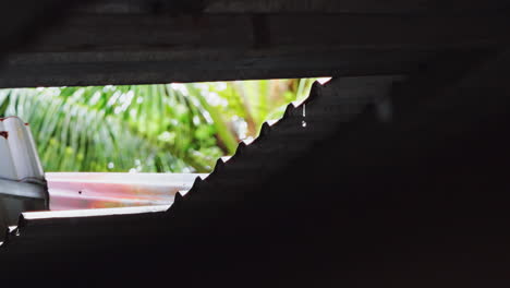 Rain-water-drops-on-metallic-roof