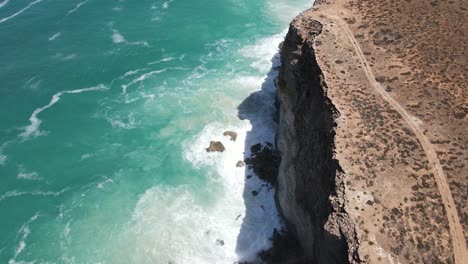 Drone-aerial-moving-forward-with-pan-up-over-the-Great-Australian-Bight-with-crashing-waves