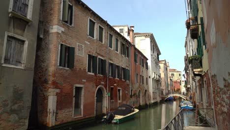 Old-Red-Brick-Houses-near-the-Water-Canal-in-Venice