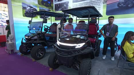Futuristic-EV-golf-cars-exhibited-at-Canton-Fair-international-import-and-export-Fair,-Guangzhou,-China
