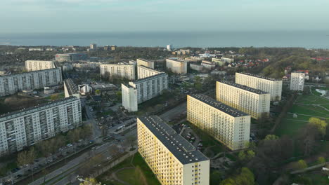 Aerial-View-Of-Rows-Of-Brutalist-Tower-Blocks-In-Zabianka-Neighbourhood-In-City-Of-Gdańsk,-Poland