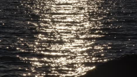 Shimmering-Waters-With-Sunlight-Reflections-At-Sunset