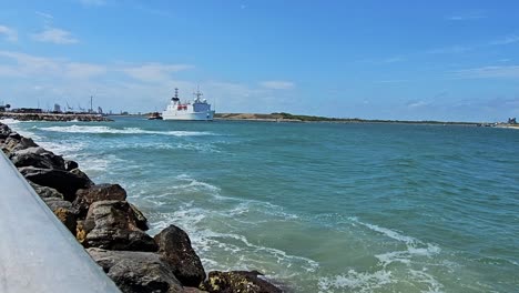 Static-view-of-big-white-ship-moving-in-water-in-cape-Canaveral-Florida