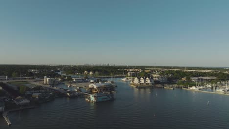 An-aerial-view-of-waterfront-restaurants,-boat-slips,-waterfront-homes,-and-waterfront-apartments-on-Clear-Lake,-off-NASA-Rd