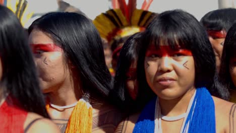 Young-Indigenous-Amazonian-Women-with-Traditional-Red-Face-Paint-in-Slow-Motion