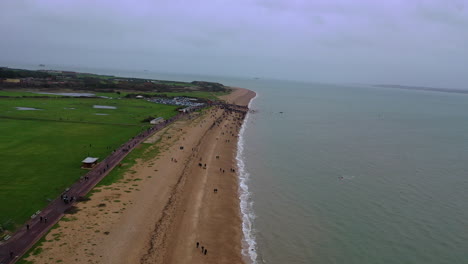 Aerial-flying-away-Gosport-New-Years-Day-Swim-UK-4K