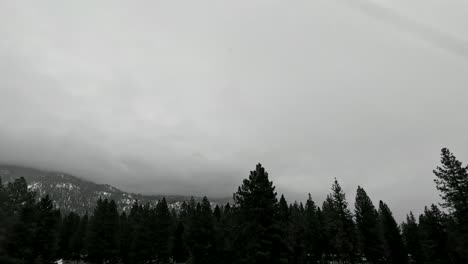 4K-Timelapse-Of-Winter-Snow-Clouds-Rolling-Over-The-High-Sierra-Nevada-Mountains