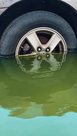 A-vehicle-submerged-in-floodwaters-post-record-rainfall-in-the-UAE