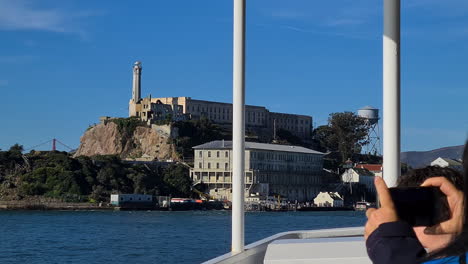 San-Francisco-CA-USA,-Alcatraz-Island-and-Federal-Penitentiary-Buildings-View-From-Ferry-Boat