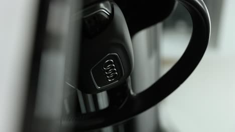 Vertical-Shot-Of-Audi-Car-Steering-Wheel