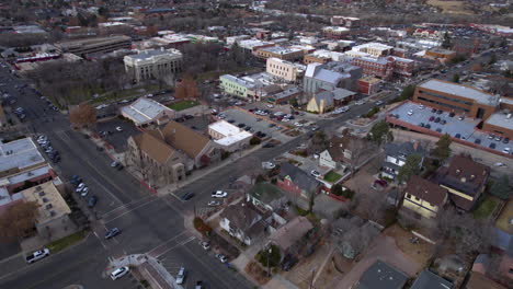 Aerial-View-of-Downtown-Prescott-Arizona-USA,-Buildings,-Street-Traffic-and-Churches,-Drone-Shot