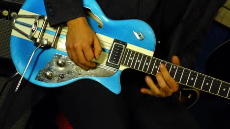 Guitar-being-played-by-rock-musician