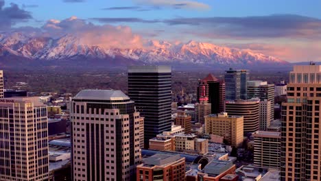 Aerial-view-of-salt-lake-city-skyline-sunset-view-glow-Salt-Lake-City-skyline-4k-Drone-shot-with-the-Wasatch-Mountain-in-the-background
