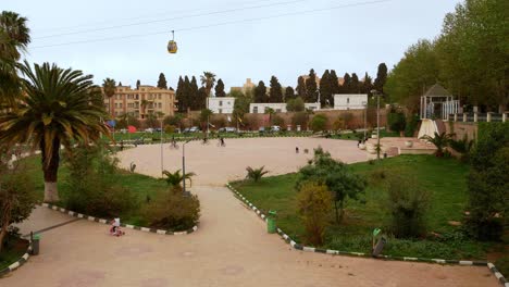 Children-playing-in-the-Grand-Bassin-square,-late-evening-during-Ramadan