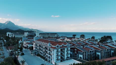 Drone-View-of-Kemer-City-of-Antalya,-Resort-Town-on-Mediterranean-Coast-of-Turkey
