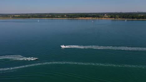 Aerial-flying-over-Lepe-Beach-and-boats-Sunny-Day-UK-4K