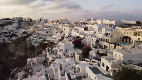 Santorini-Greece,-Oia-At-Sunset,-White-Buildings-During-Beautiful-Evening-Ocean-Golden-Hour