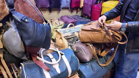 Leather-shop-next-to-tannery-in-Fes-Morocco-bags-backpack