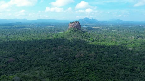 Aerial-drone-landscape-view-of-Sigiriya-rock-fortress-formation-mountain-in-bushland-forest-Dambulla-Sri-Lanka-Asia-Kandy-travel-sightseeing