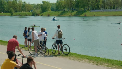 People-watching-the-boat-regatta-race-on-Lake-Jarun,-Zagreb