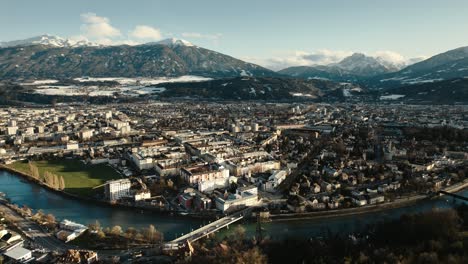 Aerial-drone-shot-of-city-of-Innsbruck,-Tyrol,-Austria