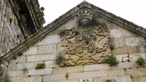 Historic-Crest-on-Church-Santa-María-de-Beade,-Ourense,-Spain