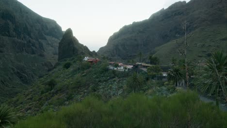 Pirate-Masca-village-in-dramatic-lanscape-on-Tenerife,-slow-panoramic-shot,-Canary-Islands-in-spring