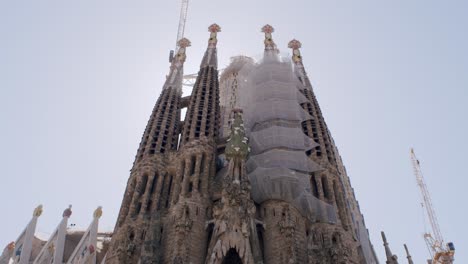 Low-angle-view-of-the-Sagrada-Familia-spires-against-a-clear-sky-in-Barcelona