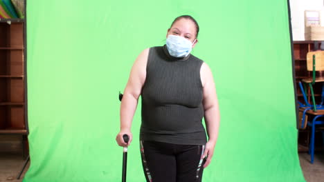 general-shot-of-disabled-woman-with-cane