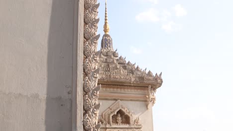 Detailed-carved-spires-from-the-top-of-Patuxai-Victory-Monument-in-the-center-of-Vientiane,-Laos