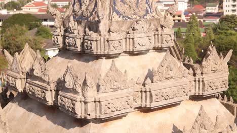Detailed-carvings-on-the-spire-of-the-roof-of-Patuxai-Victory-Monument-in-the-center-of-Vientiane,-Laos