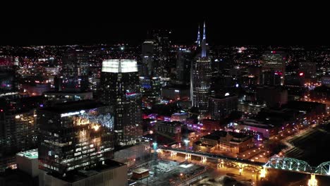 Night-Aerial-View-of-Downtown-Nashville,-Tennessee-City-Lights-Captured-in-Drone-Shot-in-4K