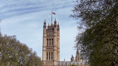 Observing-Victoria-Tower-from-the-southern-vantage-point-of-Victoria-Tower-Gardens-in-London,-encapsulating-the-concept-of-historical-majesty-amidst-serene-greenery