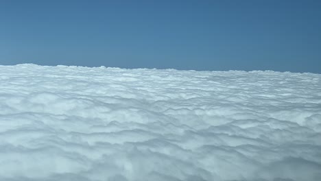 Pilot-POV-overflying-a-sea-of-white-stratus-clouds