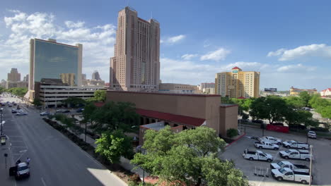 Downtown-traffic-in-San-Antonio,-Texas-at-the-Henry-B-Gonzalez-convention-center---Wide-Angle