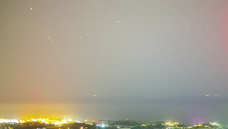 Timelapse-shot-over-the-city-of-Malaga,-Andalucia,-Spain-at-night-time