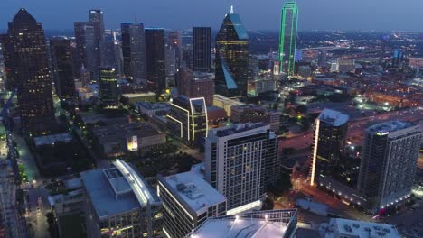 Aerial-Of-Skyscrapers-In-Downtown-Dallas-Texas-At-Night-city-drone-shot-4k