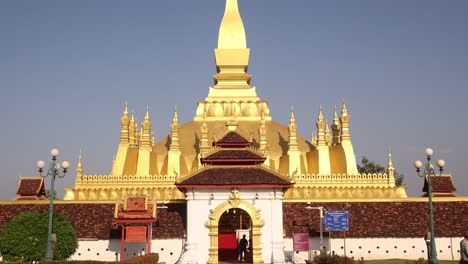 Looking-up-at-Pha-That-Luang-Golden-Stupa-in-Vientiane,-Laos