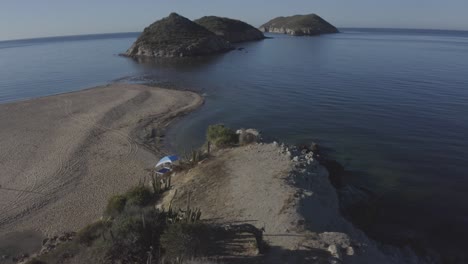 Aerial-view-of-a-beachside-campsite-in-San-Carlos,-Mexico---Sea-of-Cortez