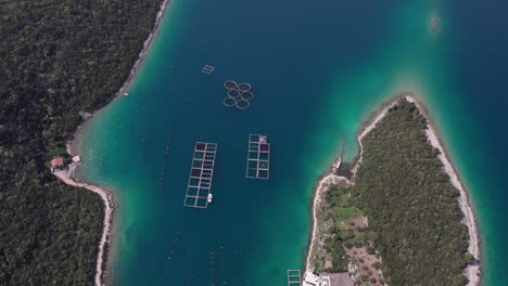 Aerial-view-of-a-bay-with-fish-farm-in-the-Mediterranean-Sea