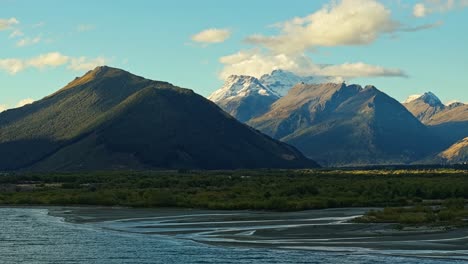 Aerial-establishing-shot-of-Lake-Wakatipu-and-snow-capped-mountains-in-Glenorchy