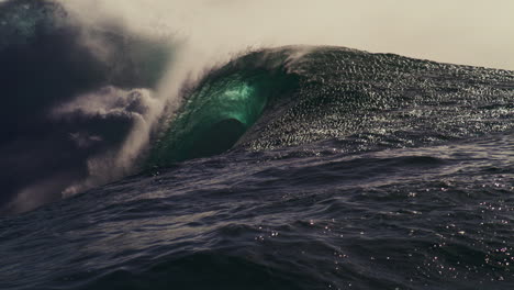 Textured-surface-of-water-and-big-wave-shoulder-crashing-and-spraying