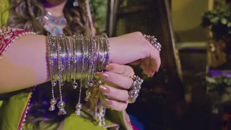 Close-up-of-a-hand-of-a-beautiful-Asian-bride-having-bangles-and-rings