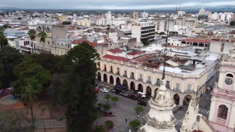 Aerial-flyover-of-bell-towers-of-Basilica-facade-in-Salta,-Argentina