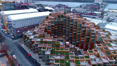 Drone-aerial-view-of-a-modern-apartment-block-with-squared-terraces